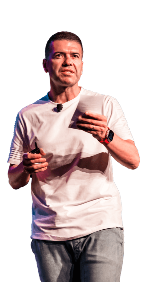Michael Fenech speaking on stage